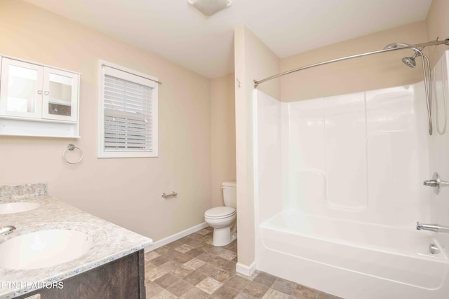 full bathroom with vanity, shower / bath combination, and toilet