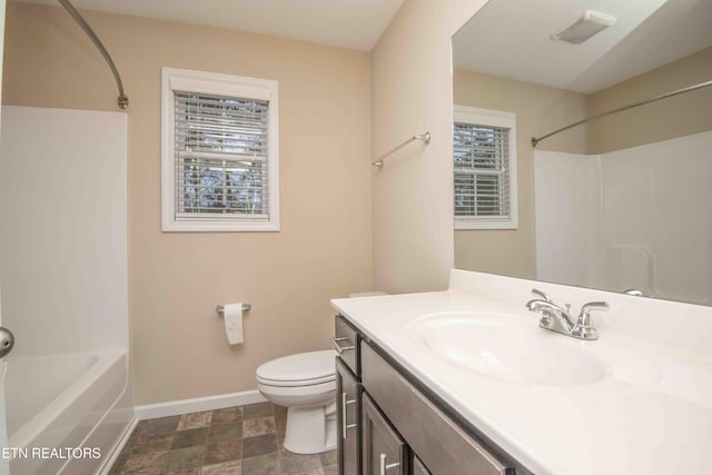 full bathroom with shower / bathing tub combination, vanity, and toilet