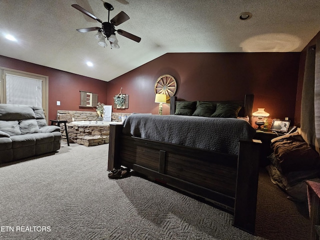 bedroom with carpet flooring, a textured ceiling, ceiling fan, and lofted ceiling