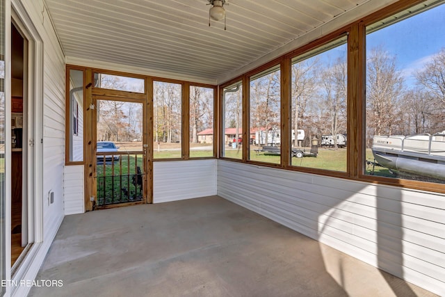 unfurnished sunroom featuring a healthy amount of sunlight