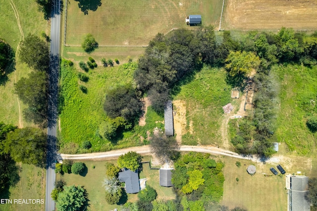 birds eye view of property with a rural view