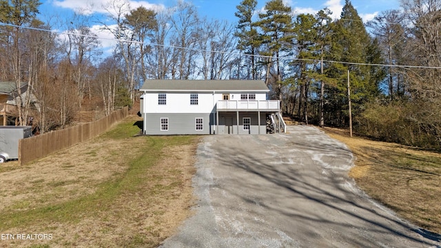 view of front of property with a deck