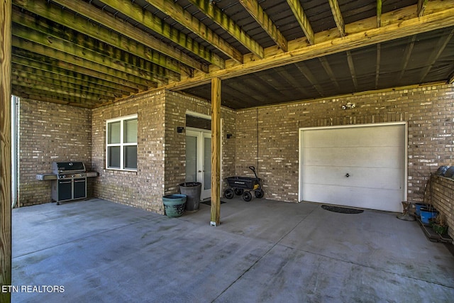 view of patio with a grill