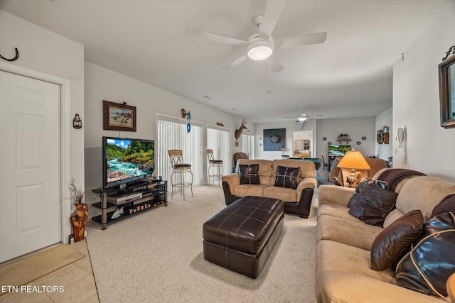 living room with ceiling fan