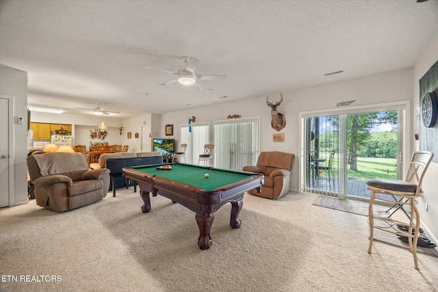 rec room featuring carpet, a textured ceiling, and billiards