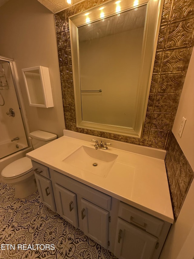 full bathroom with tile patterned floors, vanity, toilet, and shower / bath combination