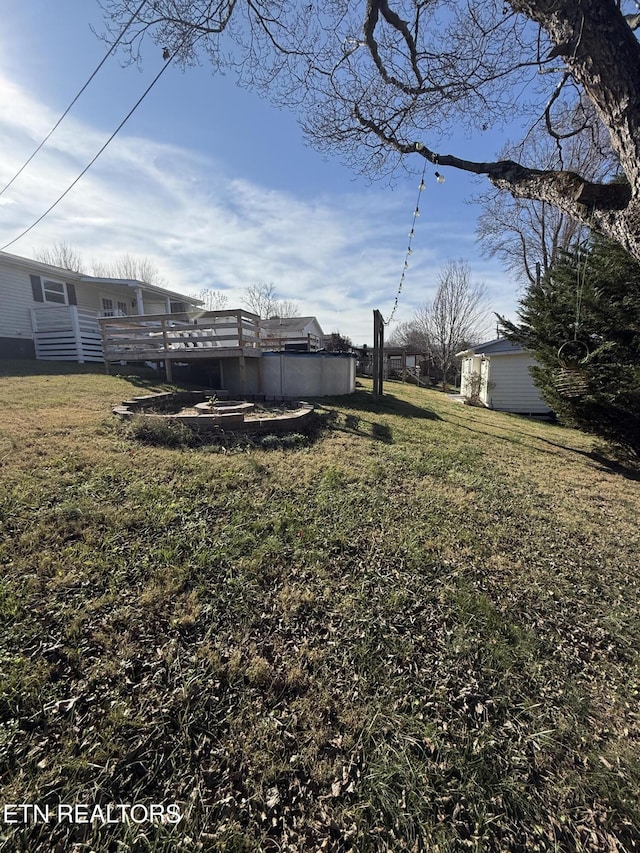 view of yard featuring a deck