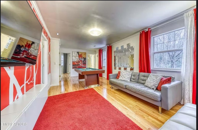 playroom with wood-type flooring, ornamental molding, and billiards