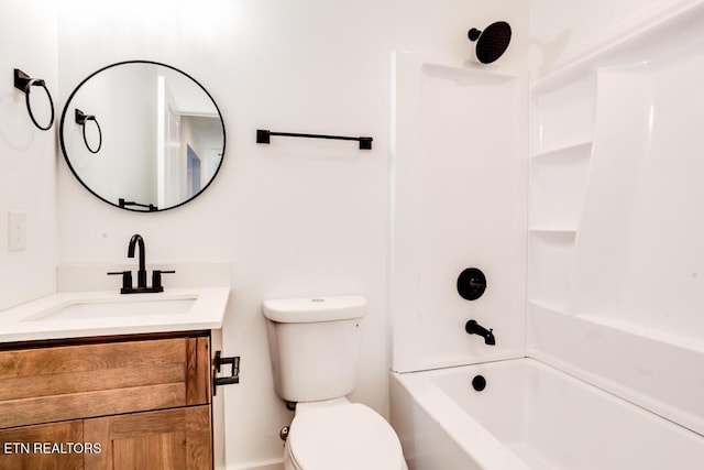 full bathroom with vanity, toilet, and shower / washtub combination