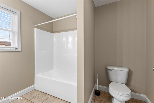 bathroom with tile patterned floors and toilet