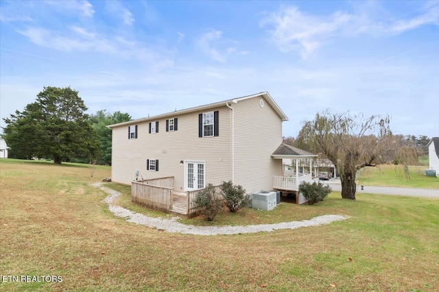 view of property exterior featuring a yard