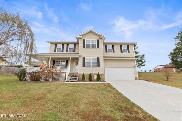 view of front of property with a front yard, a porch, and a garage