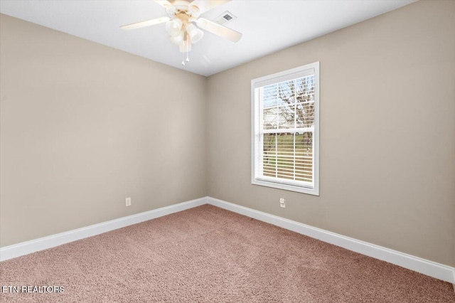 unfurnished room featuring carpet floors and ceiling fan