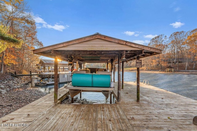 dock area featuring a water view