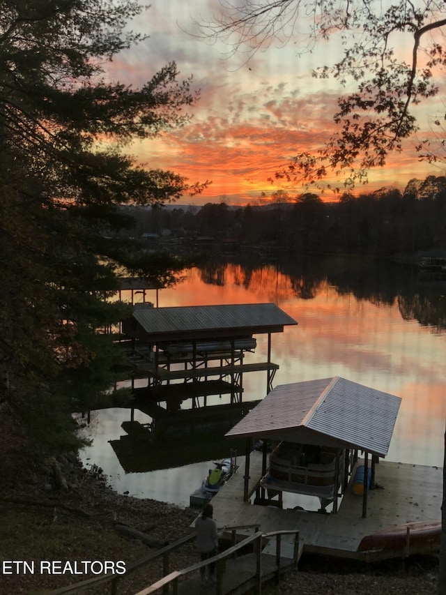 view of dock with a water view