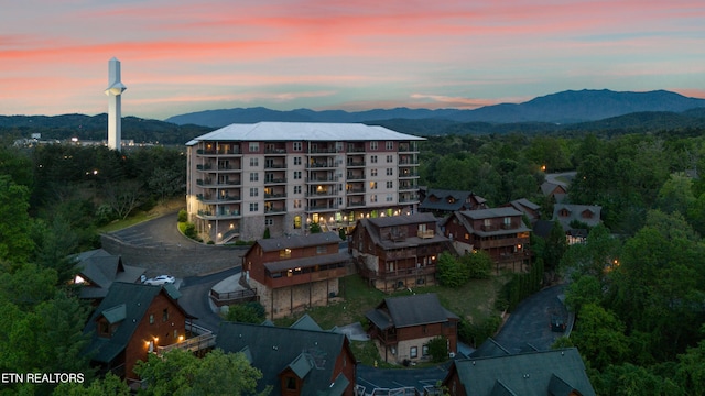 aerial view at dusk with a mountain view