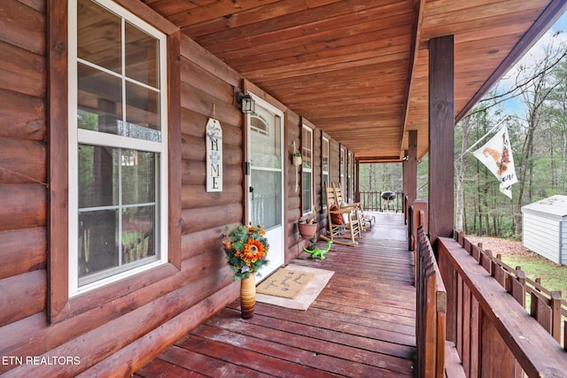 wooden deck with covered porch