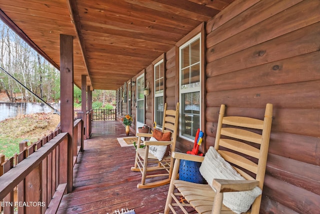 wooden deck featuring a porch