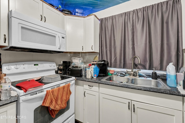 kitchen featuring white cabinets, white appliances, and sink