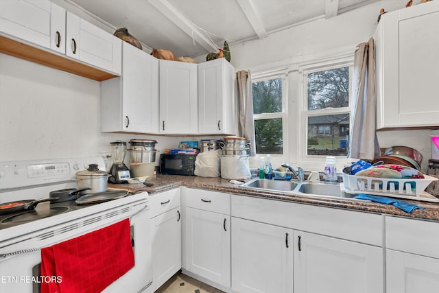 kitchen with white cabinets, beam ceiling, white gas range oven, and sink