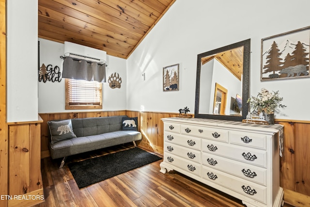 sitting room with wood walls, wooden ceiling, an AC wall unit, vaulted ceiling, and dark hardwood / wood-style flooring