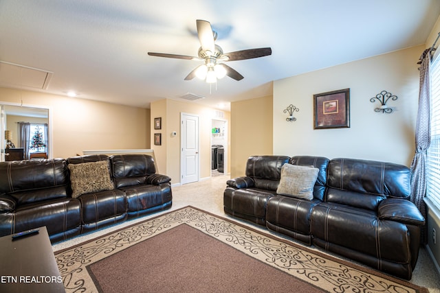 living room featuring ceiling fan