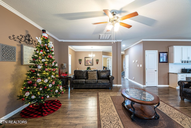 living room featuring a textured ceiling, ceiling fan with notable chandelier, dark hardwood / wood-style flooring, and crown molding