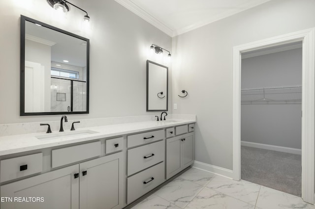 bathroom with vanity, an enclosed shower, and crown molding