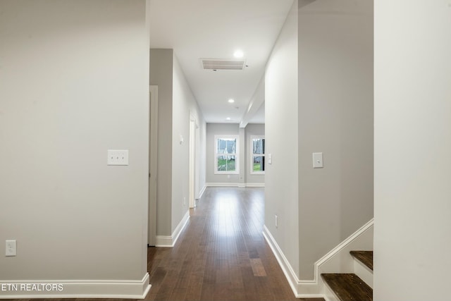 corridor featuring dark wood-type flooring