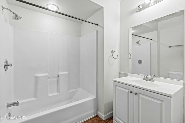 full bathroom with vanity, toilet, and bathtub / shower combination