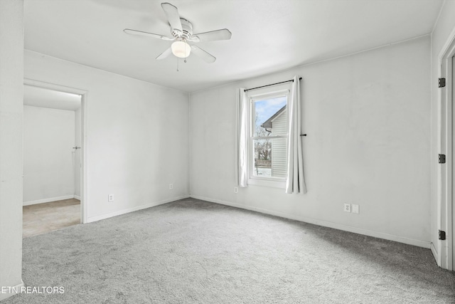 unfurnished room featuring carpet flooring and ceiling fan