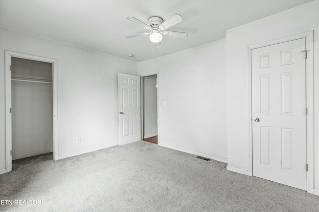 unfurnished bedroom with carpet flooring and ceiling fan