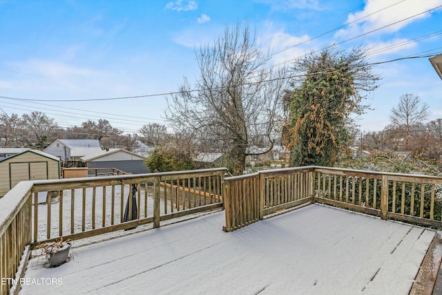 deck featuring a storage unit