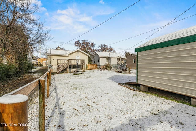 view of yard featuring a wooden deck