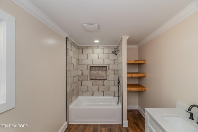 bathroom with vanity, wood-type flooring, tiled shower / bath combo, and crown molding