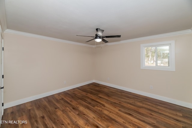 empty room with dark hardwood / wood-style floors, ceiling fan, and crown molding