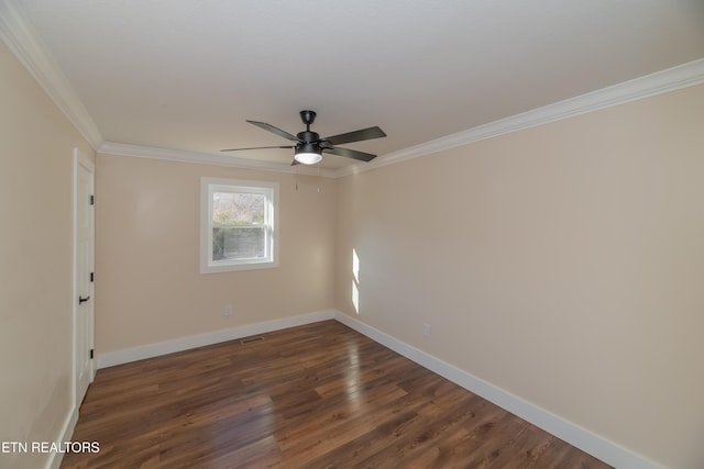 unfurnished room featuring dark hardwood / wood-style flooring, ceiling fan, and crown molding