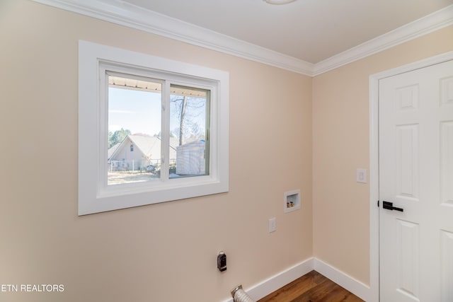 laundry area featuring hookup for an electric dryer, hardwood / wood-style floors, washer hookup, and ornamental molding