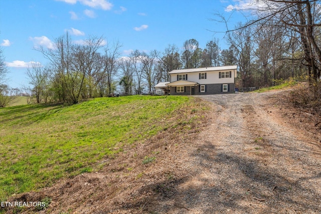 view of front of property with a front yard