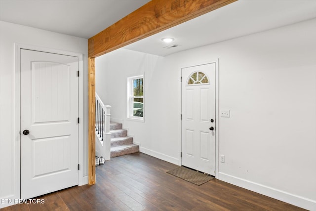 entrance foyer with dark hardwood / wood-style flooring