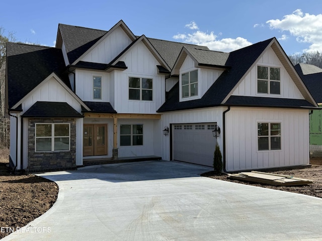 view of front of home with a garage