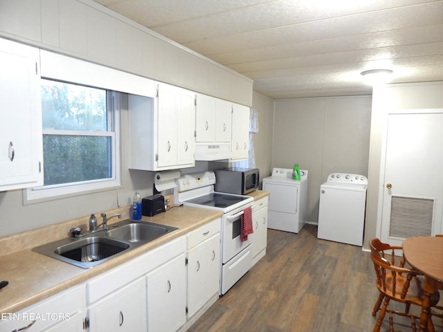 kitchen featuring ventilation hood, white cabinets, white electric range, sink, and washing machine and clothes dryer