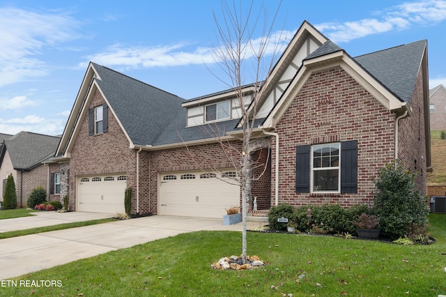 view of front facade featuring a garage and a front yard