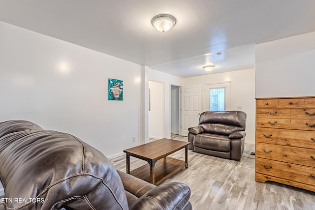 living room with light hardwood / wood-style floors