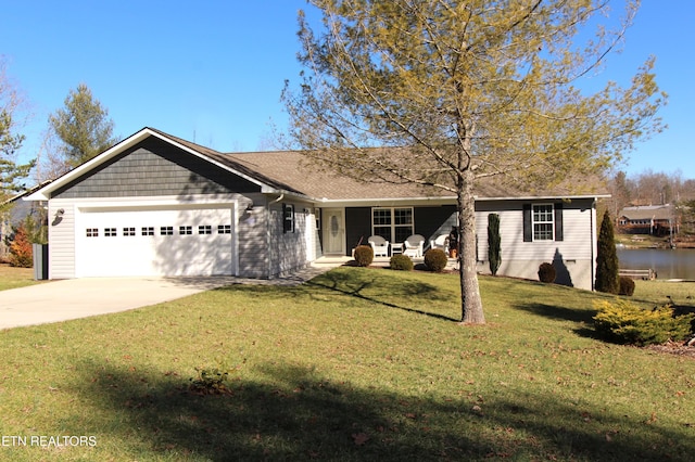 ranch-style home with driveway, a garage, and a front lawn