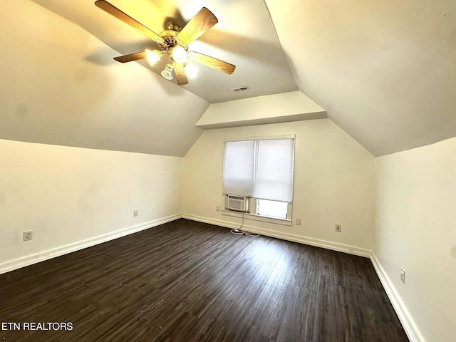 additional living space featuring lofted ceiling, ceiling fan, and dark hardwood / wood-style floors