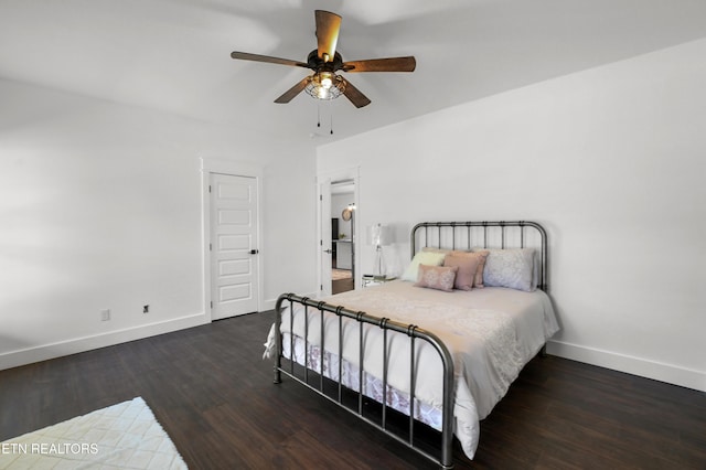 bedroom featuring ceiling fan and dark wood-type flooring