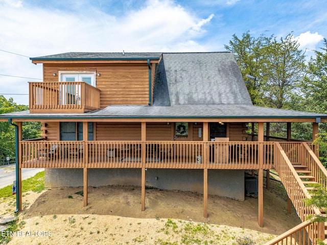 2626 Camden Way, Sevierville, TN 37876 - view of front facade with cooling unit, a balcony, and stairs