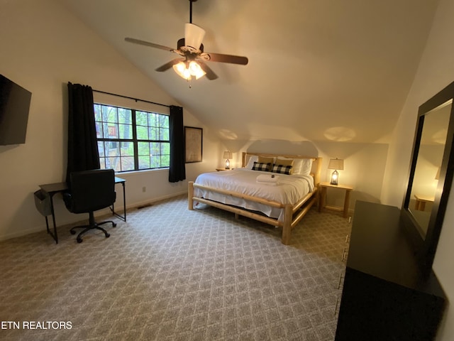 carpeted bedroom with ceiling fan and lofted ceiling