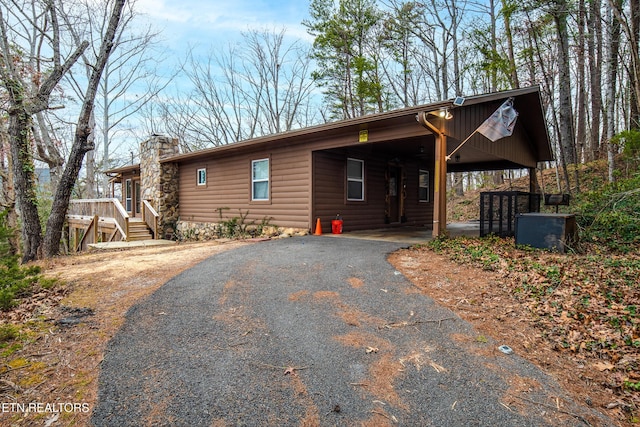 view of front of house featuring a carport